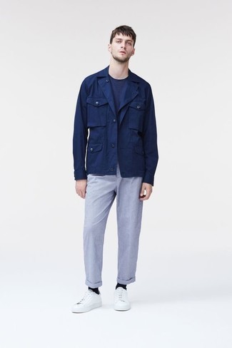 Navy Field Jacket Outfits: The combo of a navy field jacket and light blue chinos makes this a solid casual ensemble. Balance this getup with more laid-back shoes, like these white canvas low top sneakers.