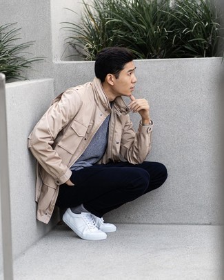 White Leather Low Top Sneakers Outfits For Men: This combo of a beige field jacket and navy chinos is undeniable proof that a pared down casual getup can still be seriously sharp. White leather low top sneakers will give an air of stylish nonchalance to an otherwise all-too-safe ensemble.