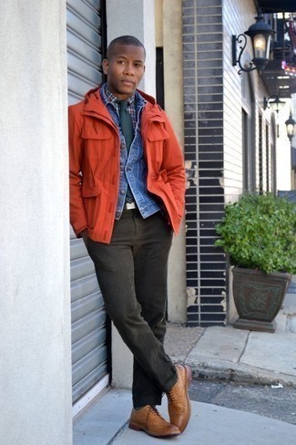 Teal Socks Outfits For Men: Hard proof that an orange field jacket and teal socks are amazing when worn together in a street style outfit. Feeling inventive? Change up your ensemble with tan leather brogues.