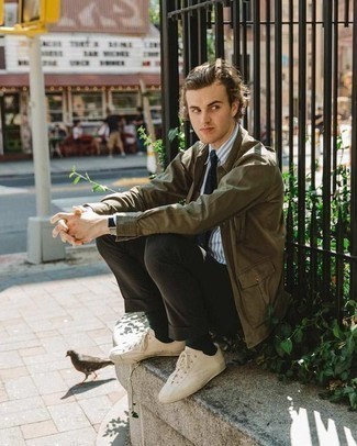 Men's Olive Field Jacket, White and Blue Vertical Striped Dress Shirt, Dark Brown Dress Pants, White Canvas Low Top Sneakers