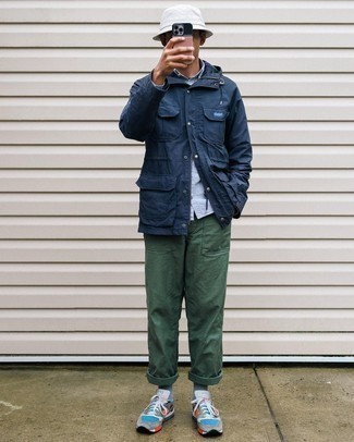 White Bucket Hat Outfits For Men: A navy field jacket and a white bucket hat are great menswear staples that will integrate perfectly within your current arsenal. A pair of multi colored athletic shoes looks perfect here.