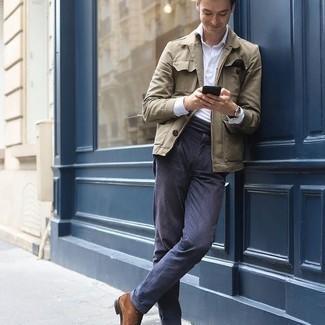 Olive Field Jacket Outfits: If you're on the hunt for an off-duty and at the same time seriously stylish ensemble, consider wearing an olive field jacket and navy chinos. For something more on the dressier side to round off your outfit, introduce a pair of brown suede casual boots to the equation.