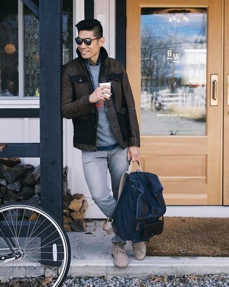 Blue Canvas Backpack Outfits For Men: Hard proof that a dark brown leather field jacket and a blue canvas backpack look awesome if you wear them together in an edgy look. Let's make a bit more effort now and complete this ensemble with a pair of beige suede desert boots.
