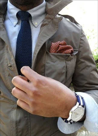 Navy Canvas Watch Outfits For Men: For a casual outfit, make an olive field jacket and a navy canvas watch your outfit choice — these two items go perfectly well together.