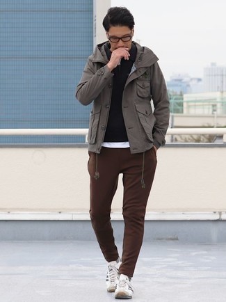 Dark Brown Sweatpants Outfits For Men: Make a grey field jacket and dark brown sweatpants your outfit choice if you wish to look casually stylish without exerting much effort. White and black canvas low top sneakers round off this look quite well.