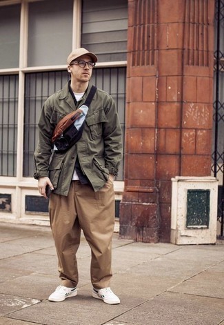 Olive Field Jacket Outfits: An olive field jacket and khaki chinos are a pairing that every sharp gent should have in his casual arsenal. Want to play it down in the footwear department? Add a pair of white and green canvas low top sneakers to the equation for the day.
