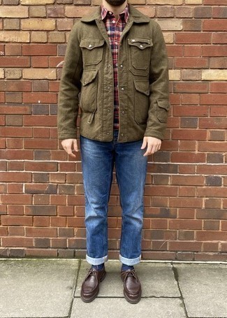 Jeans Outfits For Men: This combo of an olive wool field jacket and jeans is on the off-duty side but is also on-trend and really stylish. Let your styling prowess really shine by finishing off this outfit with dark brown leather desert boots.