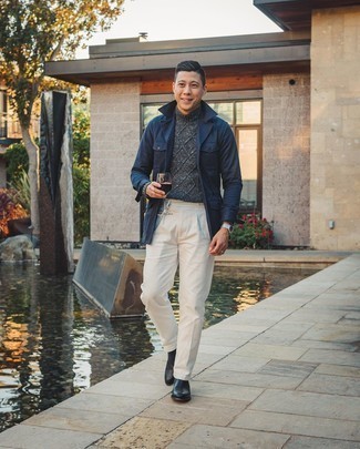 Grey Knit Wool Turtleneck Outfits For Men: To don a casual look with a twist, wear a grey knit wool turtleneck and white chinos. Take this ensemble in a classier direction by rounding off with a pair of black leather chelsea boots.