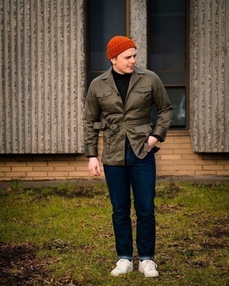 Orange Beanie Outfits For Men: An olive field jacket and an orange beanie are a cool ensemble worth integrating into your daily casual repertoire. Add white leather low top sneakers to the mix for a masculine aesthetic.