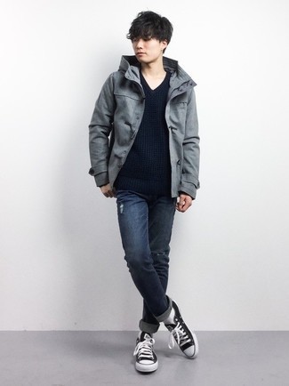 Men's Grey Field Jacket, Navy V-neck Sweater, Navy Ripped Jeans, Black and White Canvas Low Top Sneakers