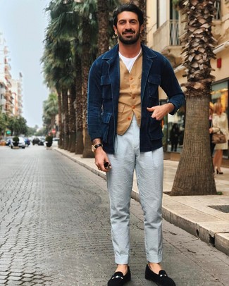 Navy Denim Field Jacket Outfits: Go for a pared down but at the same time casual and cool choice by opting for a navy denim field jacket and light blue vertical striped chinos. A pair of black suede loafers will put a more polished spin on your look.