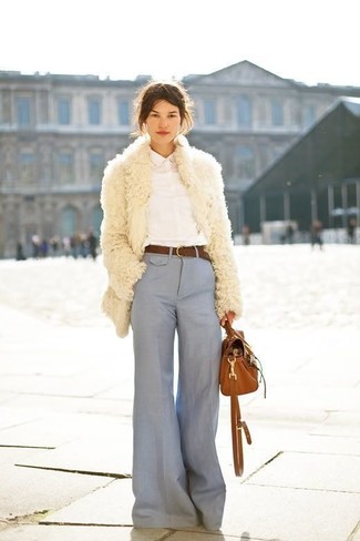 Brown Leather Belt Outfits For Women: A beige fur coat and a brown leather belt? It's easily a wearable getup that anyone could rock a version of on a daily basis.