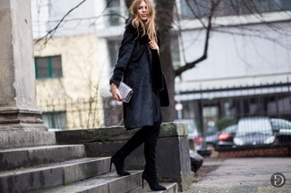 Putting together a black fur coat and a black midi dress is a guaranteed way to infuse your styling collection with some class. The whole outfit comes together perfectly if you complete your look with black suede knee high boots.
