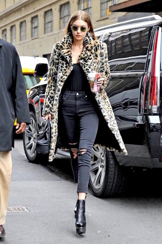 500+ Casual Outfits For Women: Pair a tan leopard fur coat with black ripped skinny jeans for a functional look that's also put together. For something more on the sophisticated end to round off this ensemble, add a pair of black chunky leather ankle boots to the equation.