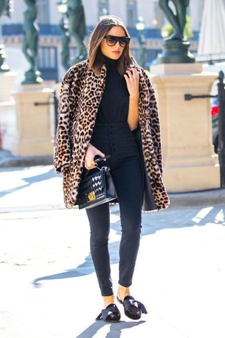 Black Suede Loafers Outfits For Women: A tan leopard fur coat looks so good when worn with black skinny jeans. A pair of black suede loafers will be a stylish complement for this look.