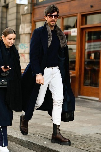 Navy Fur Collar Coat Outfits For Men: For a look that's street-style-worthy and effortlessly smart, make a navy fur collar coat and white jeans your outfit choice. Rounding off with dark brown leather chelsea boots is a fail-safe way to add a little classiness to your ensemble.