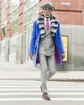 Violet Polka Dot Tie Cold Weather Outfits For Men: Wear a violet fur collar coat with a violet polka dot tie to be the picture of refinement. For maximum impact, enter a pair of burgundy leather oxford shoes into the equation.