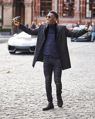 Fur Collar Coat Outfits For Men: This pairing of a fur collar coat and charcoal ripped skinny jeans is undeniable proof that a simple casual look can still be extra sharp. Clueless about how to complement this getup? Wear a pair of charcoal suede chelsea boots to ramp it up.