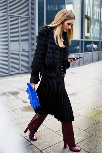 Black Pleated Midi Skirt Outfits: Display your outfit coordination sensibilities by opting for a black fur jacket and a black pleated midi skirt. Introduce a pair of burgundy leather knee high boots to this look et voila, your outfit is complete.