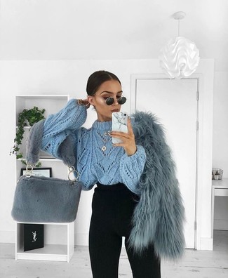Light Blue Knit Oversized Sweater Outfits: No matter where you find yourself over the course of the day, you'll be stylishly prepared in this off-duty pairing of a light blue knit oversized sweater and black skinny pants.