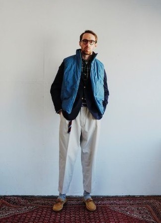 Men's Outfits 2022: Go for dapper style in a blue gilet and a navy blazer. Tan suede loafers will bring an elegant twist to an otherwise everyday ensemble.