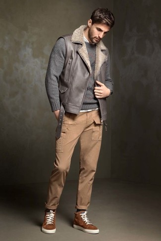 Grey Leather Gilet Outfits For Men: Pairing a grey leather gilet with khaki cargo pants is a nice pick for a casual yet on-trend ensemble. Balance this ensemble with more laid-back shoes, such as these brown suede high top sneakers.