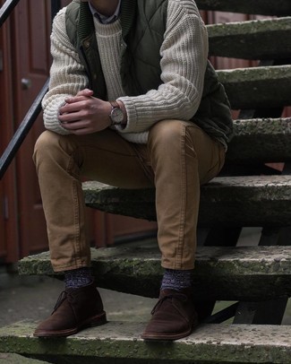 Dark Brown Suede Desert Boots Smart Casual Outfits: Wear an olive quilted gilet and khaki chinos for an on-trend, off-duty look. A pair of dark brown suede desert boots immediately kicks up the fashion factor of your ensemble.
