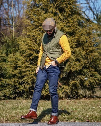 Orange Crew-neck Sweater Outfits For Men: To put together a relaxed look with a modern finish, opt for an orange crew-neck sweater and navy jeans. To give your overall ensemble a smarter finish, why not complement your getup with brown leather casual boots?