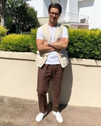 White Crew-neck T-shirt with Low Top Sneakers Smart Casual Spring Outfits For Men: Combining a white crew-neck t-shirt with brown dress pants is an on-point idea for a casually smart outfit. A pair of low top sneakers can instantly play down a classic look. This combination is a nice option when warmer days are here.