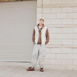 White Baseball Cap Outfits For Men: Such essentials as a white gilet and a white baseball cap are the perfect way to infuse understated dapperness into your casual styling repertoire. Brown athletic shoes are a stylish companion for your outfit.