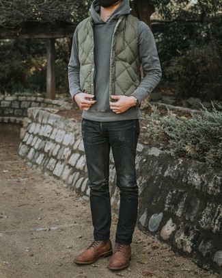 Tobacco Leather Casual Boots Relaxed Outfits For Men: This street style pairing of an olive quilted gilet and black ripped jeans is very versatile and really up for whatever's on your errand list today. Complete your getup with tobacco leather casual boots for an added dose of style.