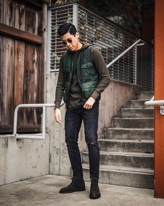 Olive Quilted Gilet Outfits For Men: If you're a fan of relaxed dressing, why not try this combo of an olive quilted gilet and charcoal ripped skinny jeans? Dark brown suede casual boots are an effective way to bring a hint of class to your ensemble.