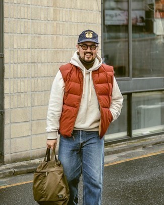 Olive Canvas Tote Bag Outfits For Men: Dress in an orange quilted gilet and an olive canvas tote bag to pull together an off-duty and absolutely dapper look.