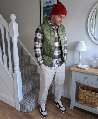 Men's Olive Quilted Gilet, Multi colored Plaid Flannel Long Sleeve Shirt, Grey Chinos, White and Black Athletic Shoes