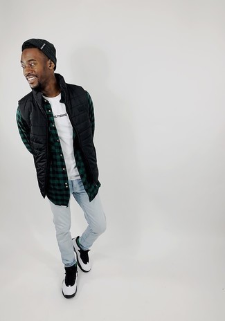 White and Brown Athletic Shoes Outfits For Men: For a cool and relaxed look, team a black quilted gilet with light blue jeans — these two items fit pretty good together. Take an otherwise standard getup a less formal path by finishing off with a pair of white and brown athletic shoes.