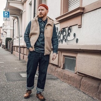Tan Fleece Gilet Outfits For Men: Wear a tan fleece gilet and navy jeans to pull together a casually cool getup. To add a bit of zing to this ensemble, introduce brown leather derby shoes to this look.