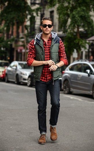 Dark Green Gilet Outfits For Men: For an outfit that brings functionality and dapperness, rock a dark green gilet with black jeans. For maximum effect, round off with a pair of brown suede desert boots.