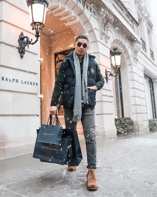 Grey Jeans Outfits For Men: This casual street style combo of a navy quilted gilet and grey jeans is super versatile and really up for whatever's on your errand list today. Finishing off with tan suede casual boots is the simplest way to introduce a little fanciness to this getup.