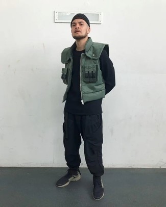 Dark Green Gilet Outfits For Men: A dark green gilet and black cargo pants are a pairing that every modern man should have in his menswear collection. To bring out a more easy-going side of you, complement your outfit with a pair of black athletic shoes.