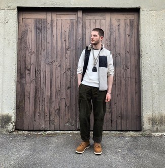 Men's White and Black Fleece Gilet, White Long Sleeve T-Shirt, Dark Green Corduroy Chinos, Brown Suede Casual Boots