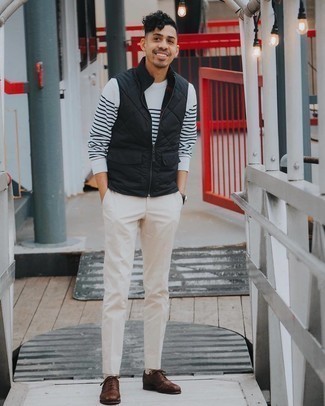 White and Black Horizontal Striped Long Sleeve T-Shirt Outfits For Men: Prove that no-one does casual like you in a white and black horizontal striped long sleeve t-shirt and beige chinos. You know how to elevate this look: dark brown leather oxford shoes.
