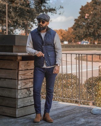 Grey Long Sleeve T-Shirt Outfits For Men: This off-duty combination of a grey long sleeve t-shirt and navy jeans is a safe bet when you need to look dapper in a flash. A pair of brown suede chelsea boots easily bumps up the wow factor of any ensemble.