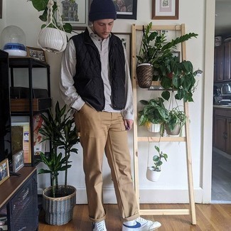 Men's Black Quilted Gilet, Grey Polo Neck Sweater, Khaki Chinos, White and Blue Leather High Top Sneakers
