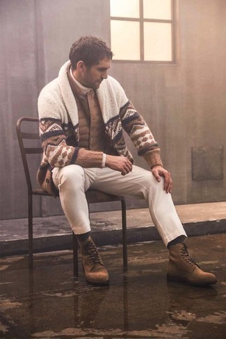 White Wool Turtleneck Outfits For Men: A white wool turtleneck and beige chinos are among those game-changing menswear elements that can modernize your wardrobe. To give this outfit a more refined finish, why not introduce brown suede casual boots to the mix?
