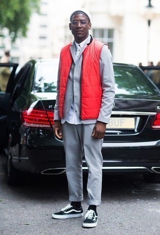 Burgundy Quilted Gilet Outfits For Men: This elegant combination of a burgundy quilted gilet and a grey suit is really a statement-maker. If you need to instantly tone down this ensemble with shoes, why not introduce a pair of black and white canvas low top sneakers to the mix?
