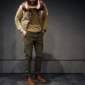 Brown Baseball Cap Outfits For Men: Pair a beige quilted gilet with a brown baseball cap for a carefree, cool-kid vibe. Don't know how to complement your ensemble? Wear a pair of brown leather chelsea boots to dress it up.