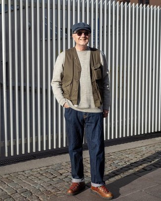 Navy Flat Cap Outfits For Men: To assemble a relaxed look with an edgy twist, go for a brown gilet and a navy flat cap. Look at how nice this getup goes with brown leather work boots.