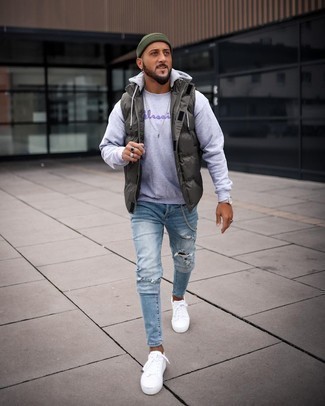 Charcoal Sweatshirt Outfits For Men: To assemble a relaxed casual outfit with a bold twist, you can easily go for a charcoal sweatshirt and light blue ripped skinny jeans. A pair of white canvas low top sneakers effortlessly ramps up the fashion factor of this ensemble.
