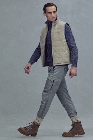Tan Quilted Gilet Outfits For Men: Try teaming a tan quilted gilet with grey cargo pants to create a casually stylish ensemble. Bring an element of stylish nonchalance to by rounding off with a pair of dark brown suede work boots.