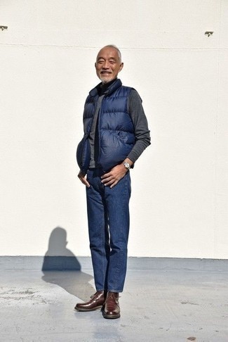 Blue Quilted Gilet Outfits For Men: Show that you do casual like no-one else by opting for a blue quilted gilet and navy jeans. To add a little fanciness to this look, complete this look with a pair of burgundy leather casual boots.